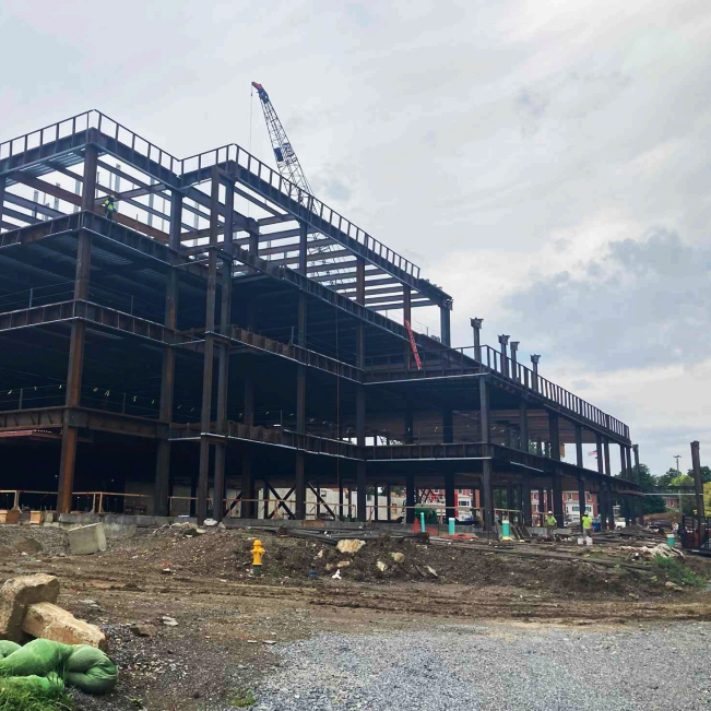 The northeast corner of the building, showing all four floors, including the terrace level.